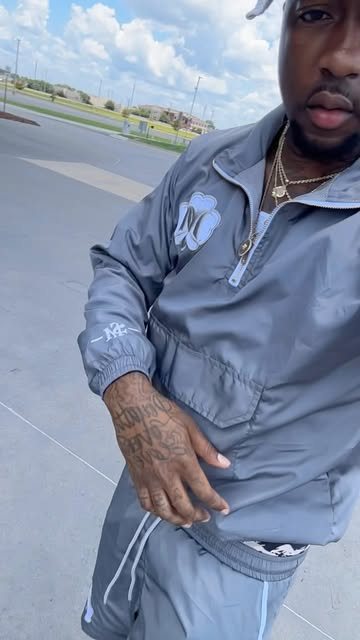 Bold Boy in the grey Mentionaire jacket