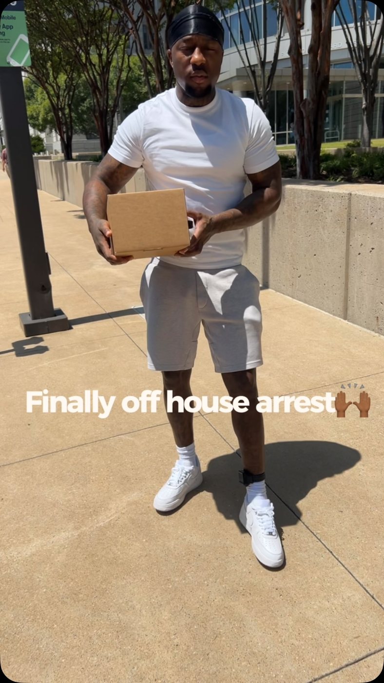 Bold Boy outside the courthouse, off house arrest